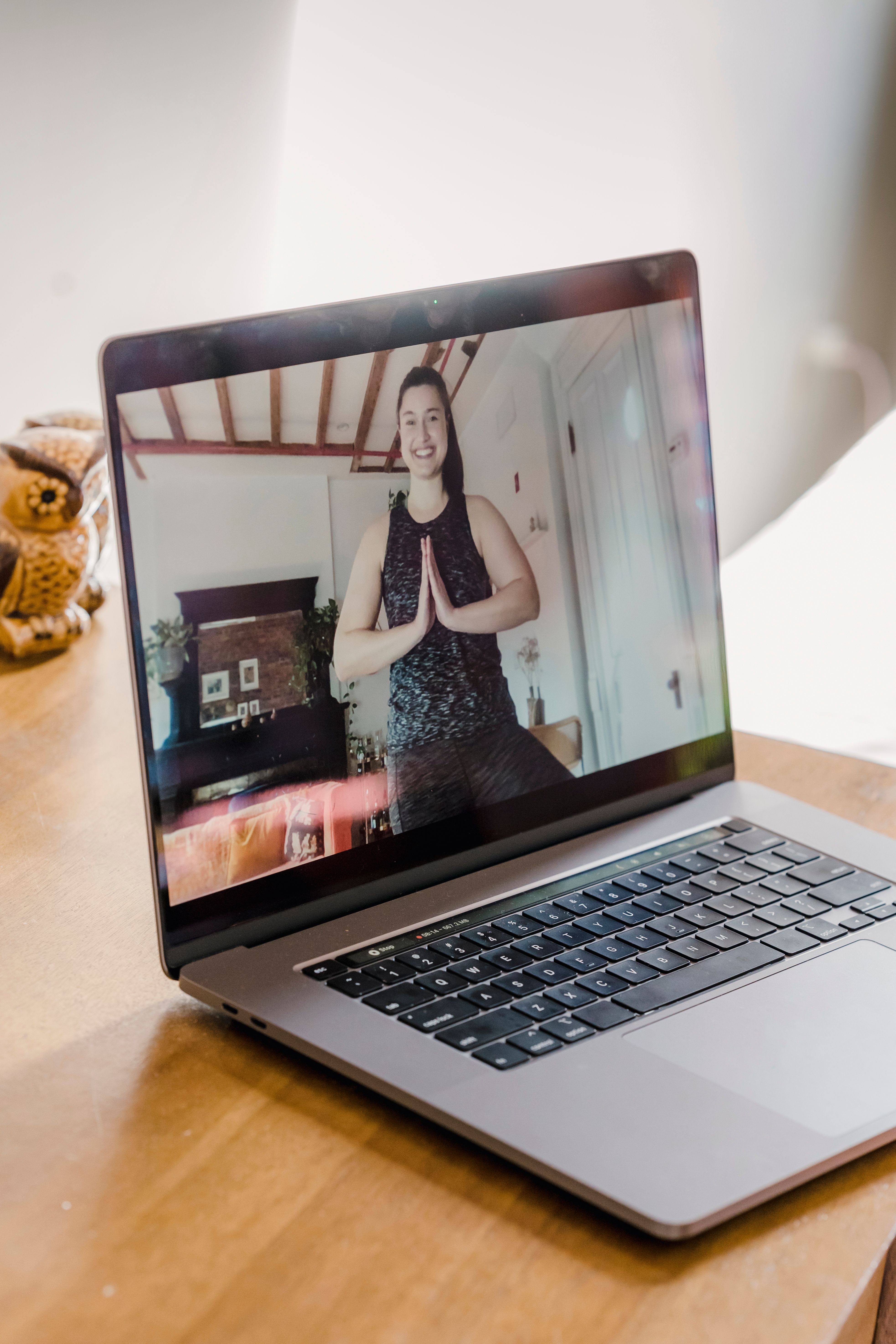 Laptop and notebook in a light-filled teaching studio